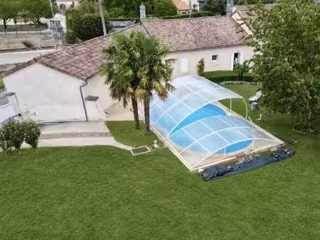 maison familiale de plain-pied avec piscine  grand garage et potentiel d'agrandissement