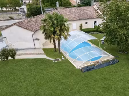 maison familiale de plain-pied avec piscine  grand garage et potentiel d'agrandissement