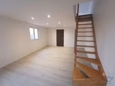 exclusif - appartement 2p en duplex de 40 m2 hab. avec stationnement