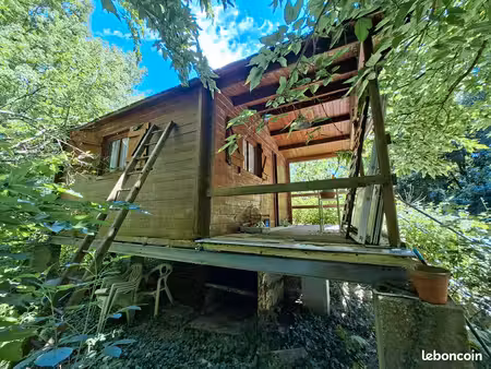 bord de rivière 595 m2 avec chalet sur pilotis 19500 euros