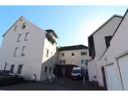 f2 de 66m2 + caves + parking :