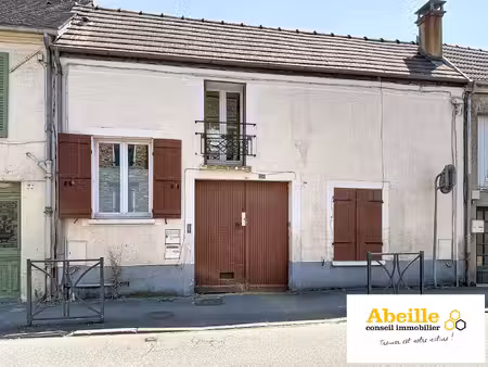 immeuble de deux appartments en centre villle avec terrain e