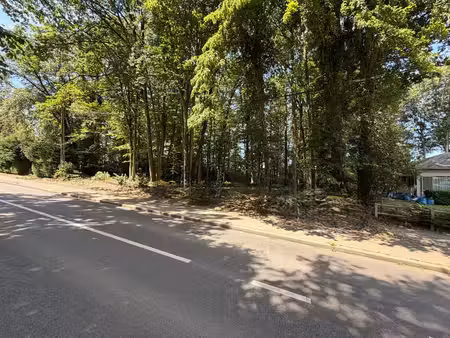 terrain constructible de ±15ares  plat et bien orienté