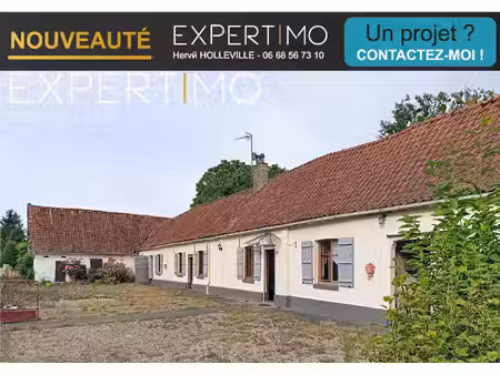 longère de caractère avec nombreuses dépendances et fort pot