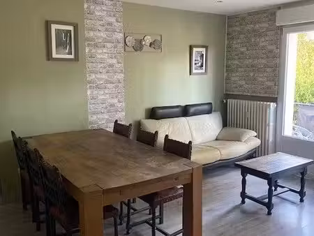 appartement lumineux de 64 m² avec balcon et cave