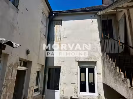 maison mitoyenne coeur village toutes commodites avec cour et garage
