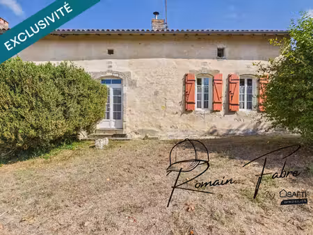 maison en pierre de 230 m2 avec 4 chambres  garage attenant et arrières chais