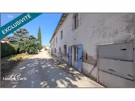 maison d'environ 160m² à rénover avec deux garages