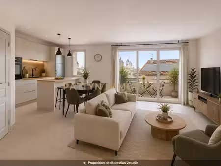 un dernier étage avec ascenseur  cave  balcon et vue dégagée  au cœur du village