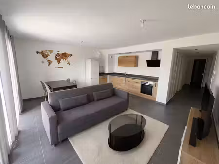 bel appartement neuf - t3 meuble avec balcon exposition sud-ouest - cuisine equipee - bour