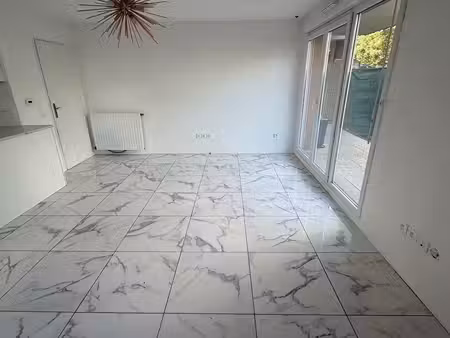 appartement 4 pièce(s) 80.59 m2 avec jardin