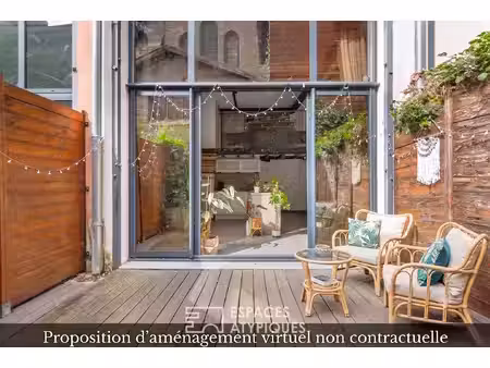 loft avec terrasse dans un ancien atelier