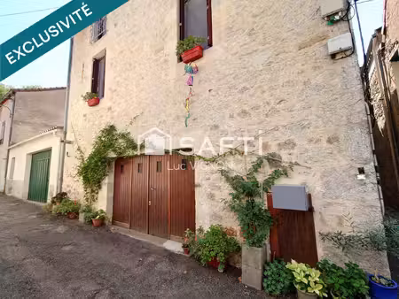 spacieuse maison de village en pierre  rénovée