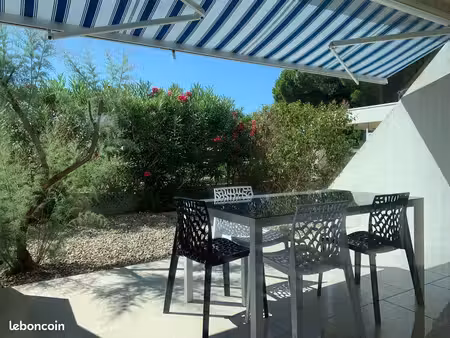 port camargue t2 garage jardinet et clim