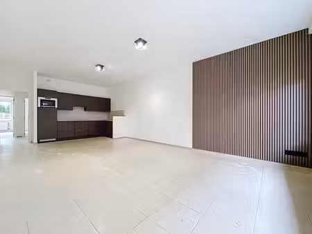 rez-de-chaussée  bel appartement rénové de +/- 79m2 - 2 ch