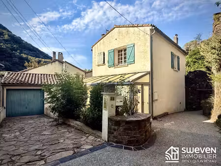 charmante maison avec jardin  garage  cave et véranda