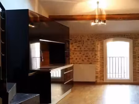 ancienne grange réaménagée en duplex style loft