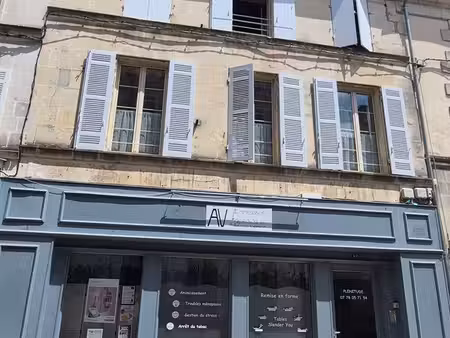 immeuble mixte commerce et habitation