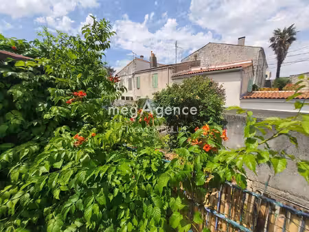 maison de ville avec garage et jardin