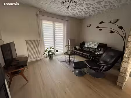 maison mitoyenne de 92 m² avec jardin  terrasse  deux garages et potentiel d’aménagement