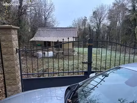 vends terrain et petite maison