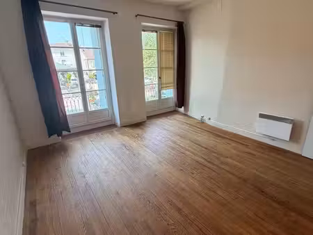 appartement 130m2 - 4 chambres - balcon - beau potentiel