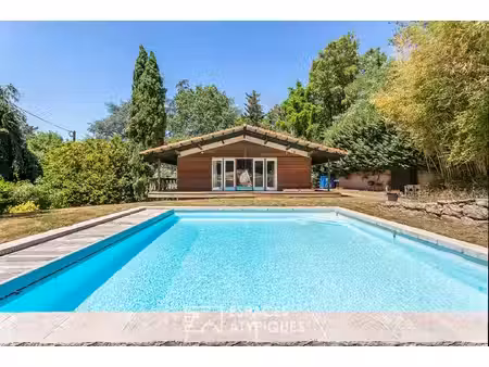 maison chalet sur les hauteurs de limonest  avec piscine