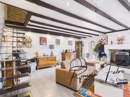 maison en pierre de 131 m2 avec 3 chambres  grande terrasse couverte et arrière chai  au c