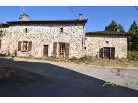 2 maisons mitoyennes avec une grange