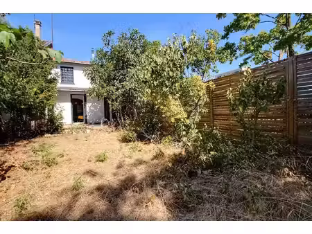 maison avec jardin  garage et cheminée