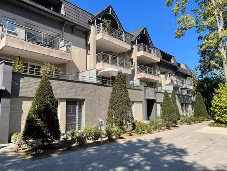 mooi parkappartement met 2 slaapkamers  garage en 2 kelders