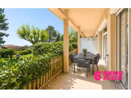 rez-de-jardin en plein centre de pollionnay