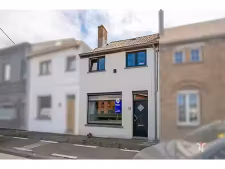 rijwoning met ruime tuin  uitweg met garage en uitbreidingsmogelijkheden.