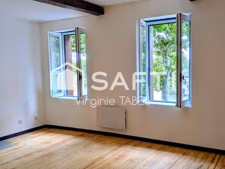 maison de ville rénovée avec jardin et garage  dpe c