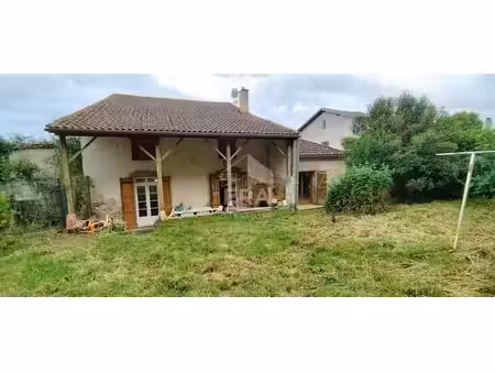 belle maison de ville en pierre avec garage et jardin