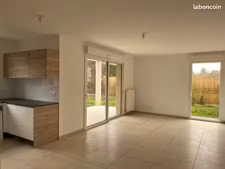 appartement t3 de 69 m² avec jardin privatif et double garage à saint-bernard