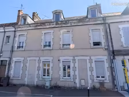 ensemble immobilier complet – immeuble + maison + 15 garages 100% loué