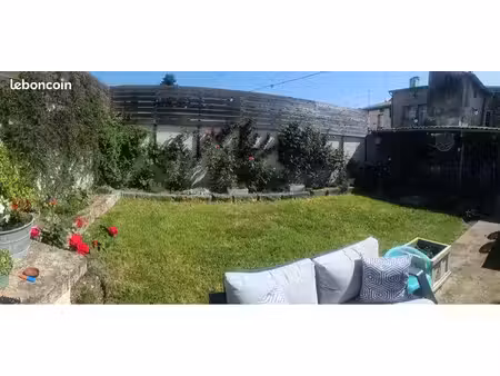 maison avec garage et jardin centre ville