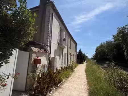 appartement combleux 4 pièce(s) 83.23 m2 + terrasse + box - bord du canal -