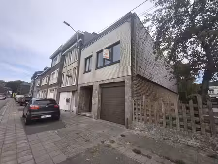 maison trois facades avec garage