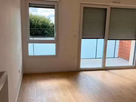 a louer f3 65 m2 avec terrasse et 2 places de parking - vendeville