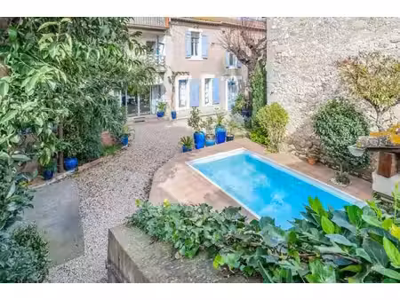 demeure de caractère avec piscine  dépendances et volumes spectaculaires 15' de béziers