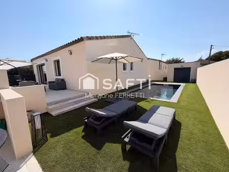 maison 100 m² avec garage et piscine sur un terrain de 402 m²
