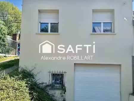 local professionnel avec terrain et garage