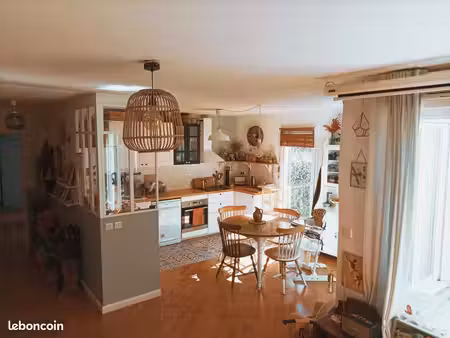 t3 rénové en rez-de-jardin avec terrasse de 20 m² et garage