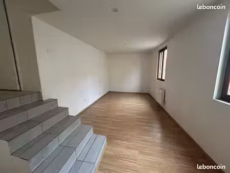appartement + cave privative et deux stationnements