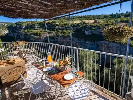 vente maison comprenant un appartement t4 et deux commerces