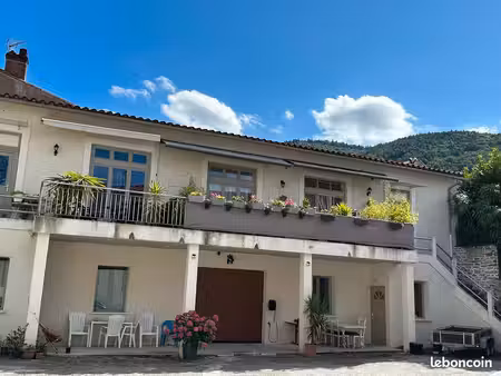 immeuble de rapport : 4 appartements + atelier et garage (fort potentiel)