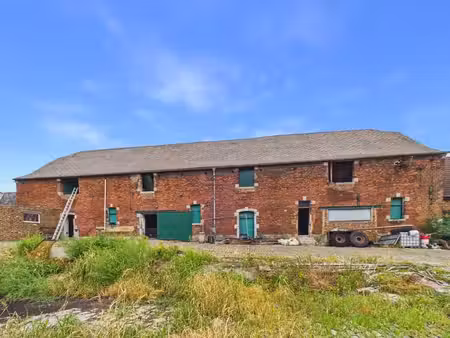 grange de ± 610 m² au potentiel exceptionnel