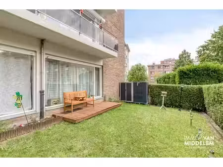 appartement au rez-de-chaussée avec 2 ch. jardin et garage